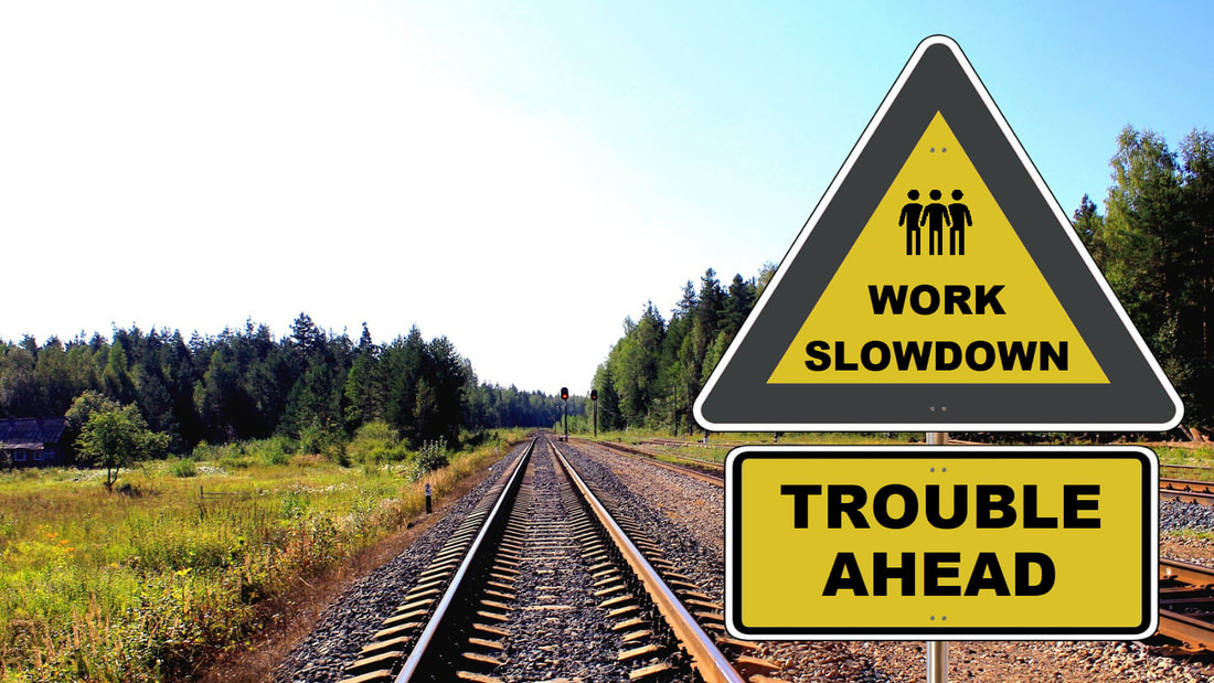 An image of railroad tracks with a warning to IBM that there is trouble ahead: 
